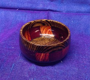 Small segmented bowl with zebrawood rim and base
