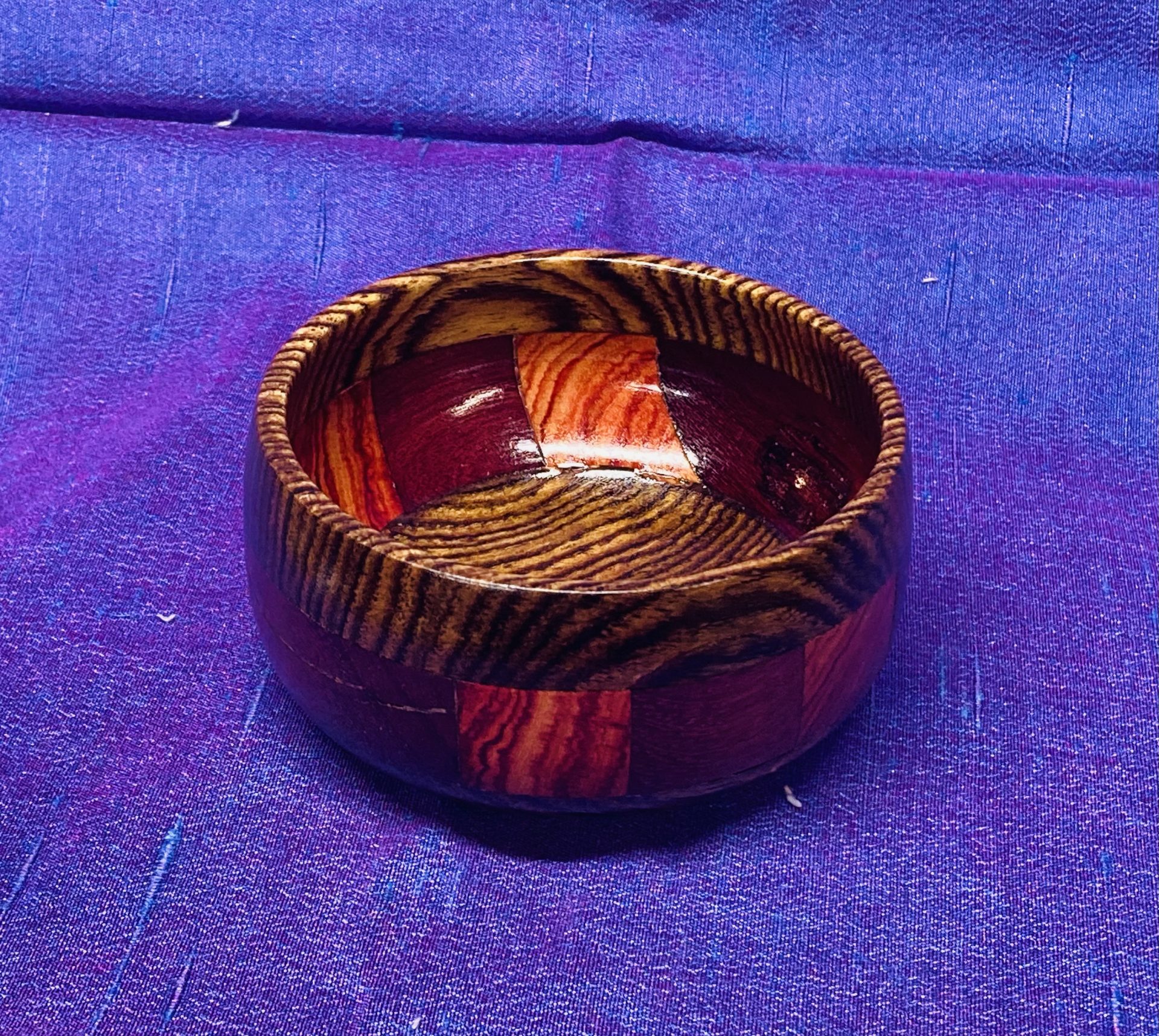 Small segmented bowl with zebrawood rim and base